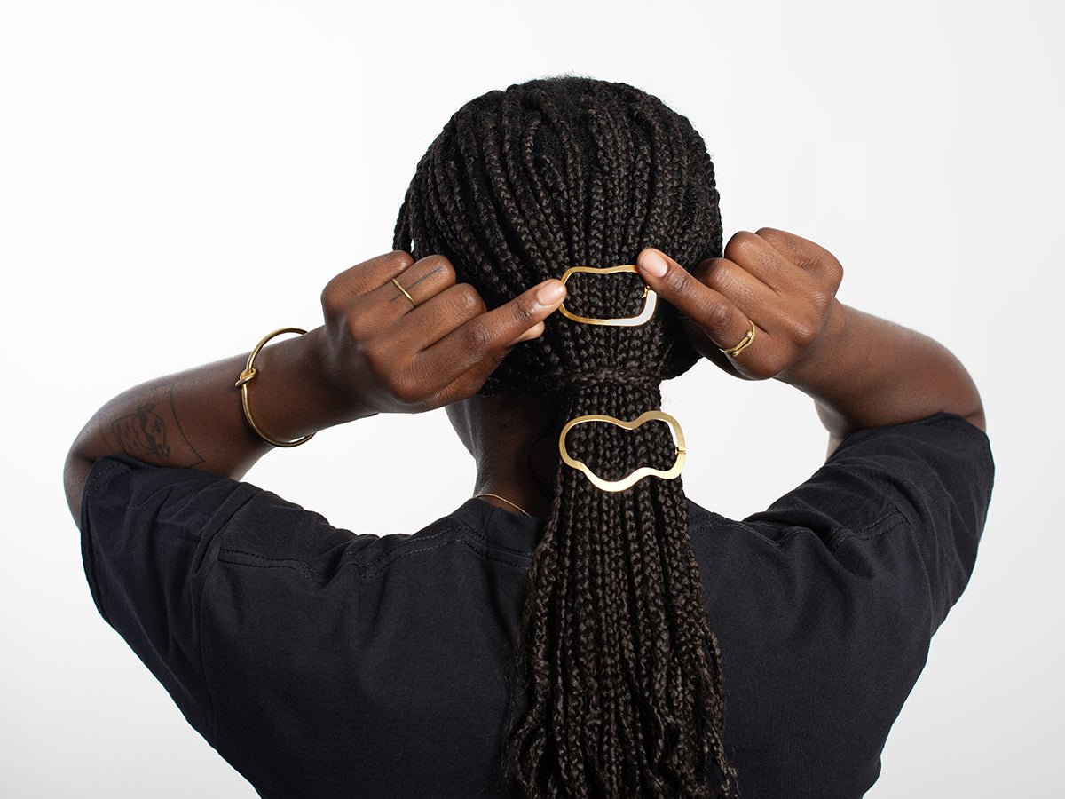 Low ponytail styled with designer hair clips Lene and Gae by Clinq