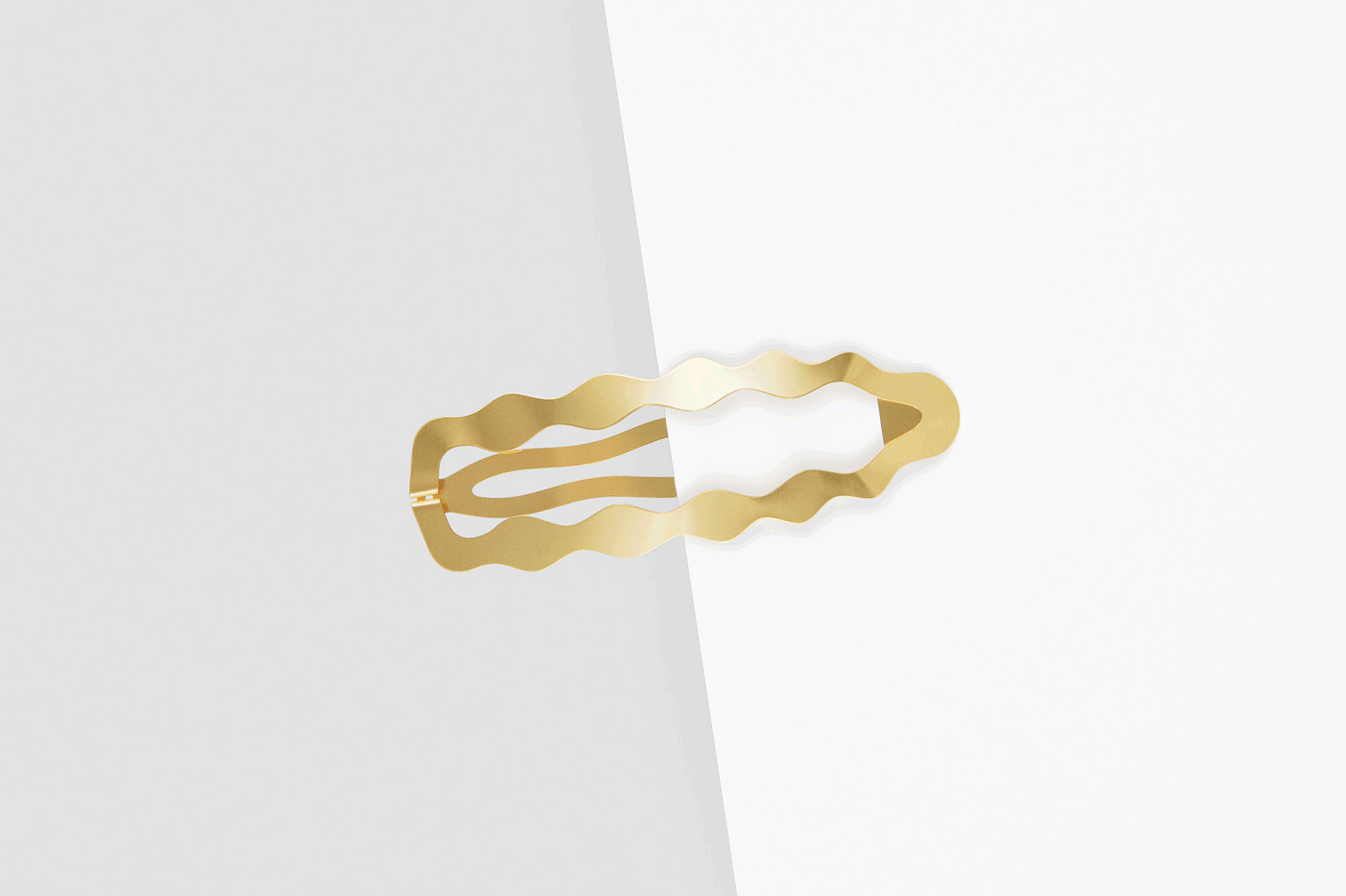 Product images of designer hair clip Dione clipped in half way