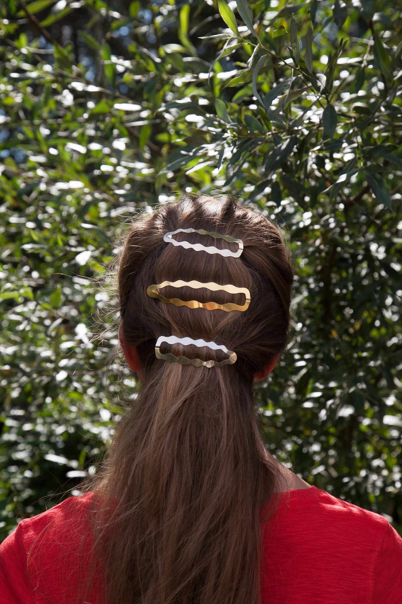 Half updo styled with Clinq hair clip Frances and Dione