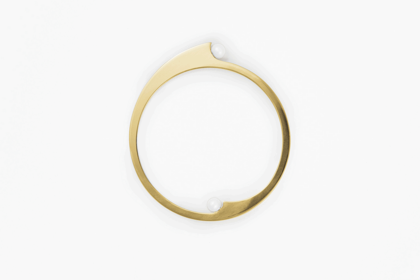 Product images of designer bangle bracelet with freshwater pearls available in Silver-plated and gold-plated
