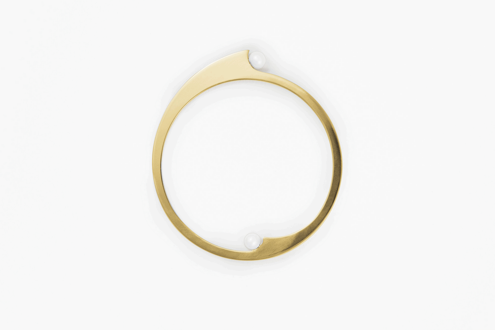 Product images of designer bangle bracelet with freshwater pearls available in Silver-plated and gold-plated