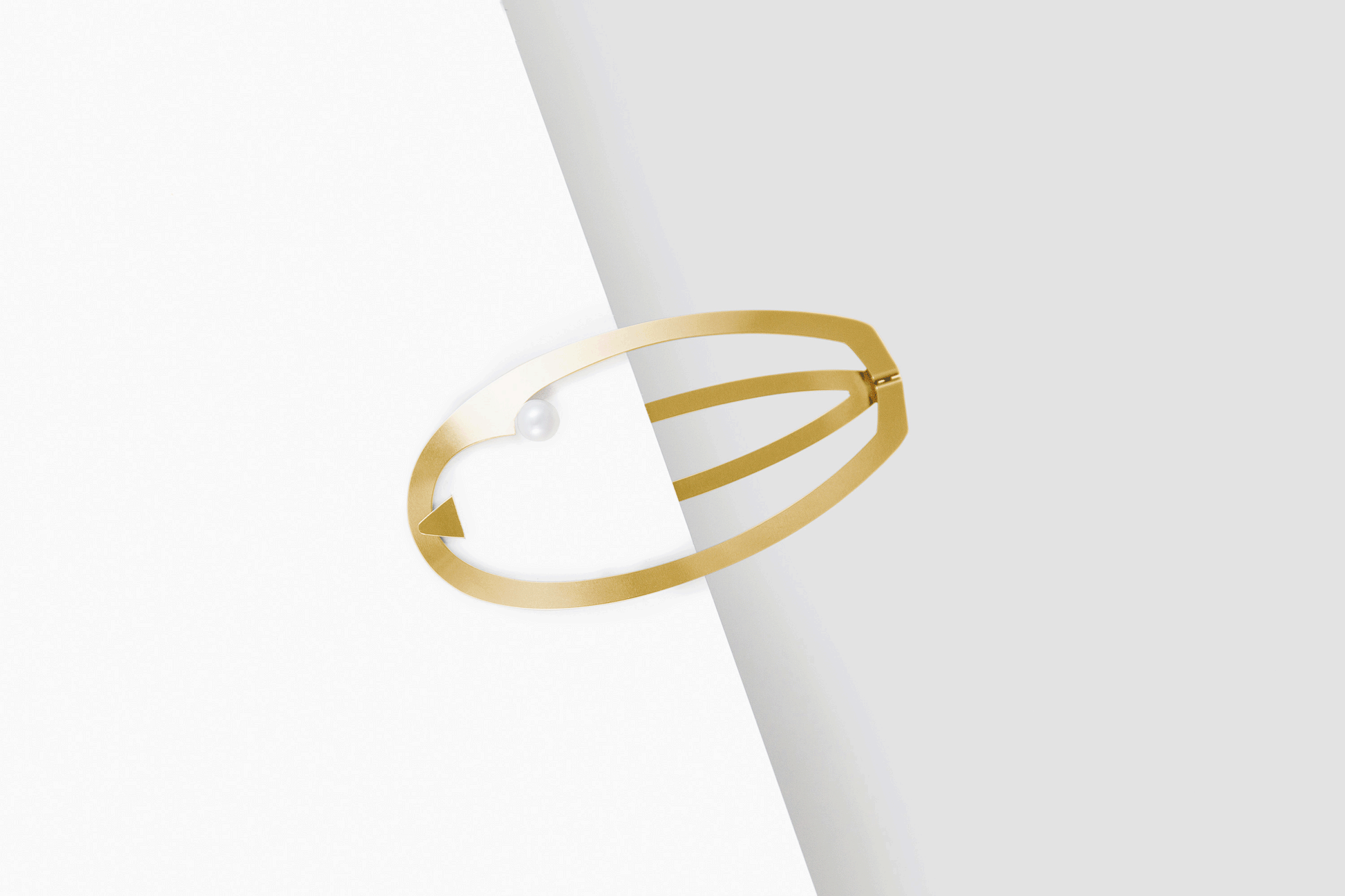Product images of designer barrette Elsa clipped in half way. Available in silver-tone, silver-plated, gold-plated and rose gold-plated