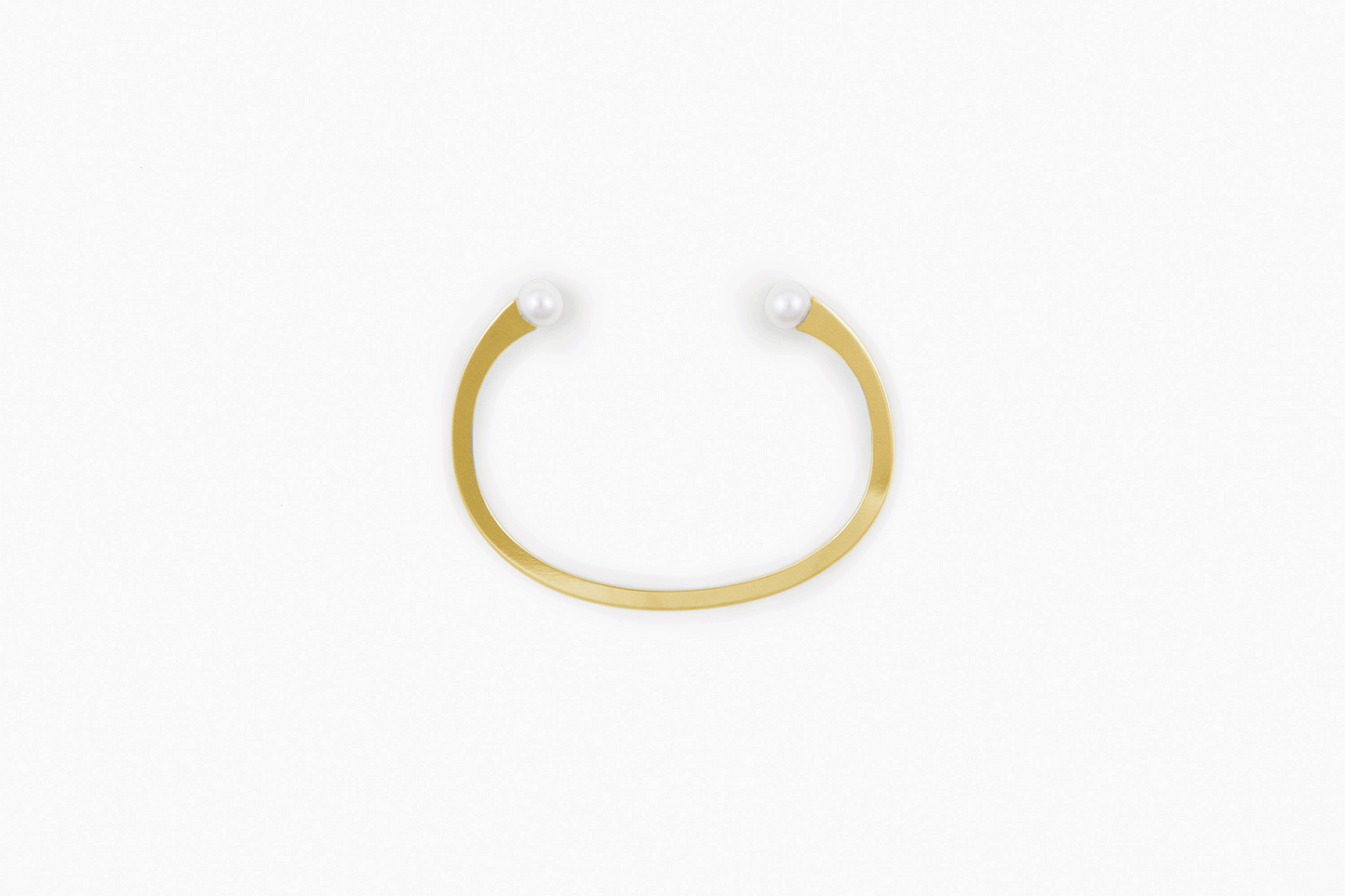 Product images of designer cuff bracelet Della by Clinq embellished with pearls