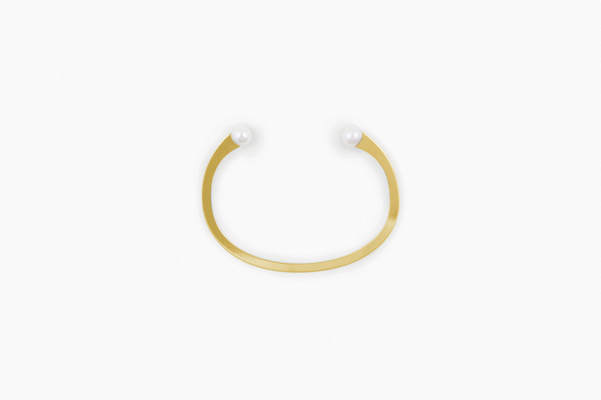 Product images of designer cuff bracelet Della by Clinq embellished with pearls