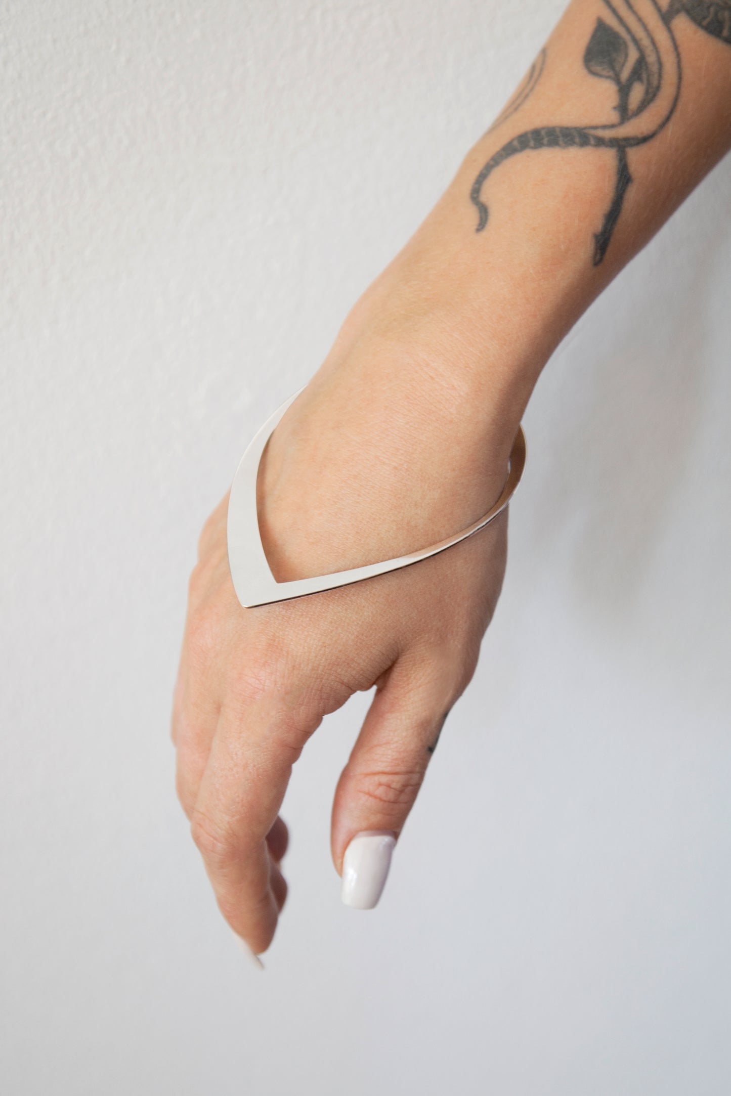 Edgy Designer Bangle Bracelet ANYA by CLINQ. Hand polished brass . Available in Silver-plated and Gold-plated