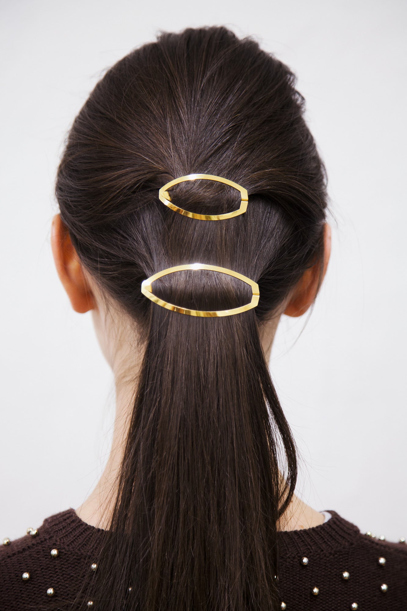 Neat half updo secured with designer hair clips ALVA and LEONA. Made from high quality materials designed to last