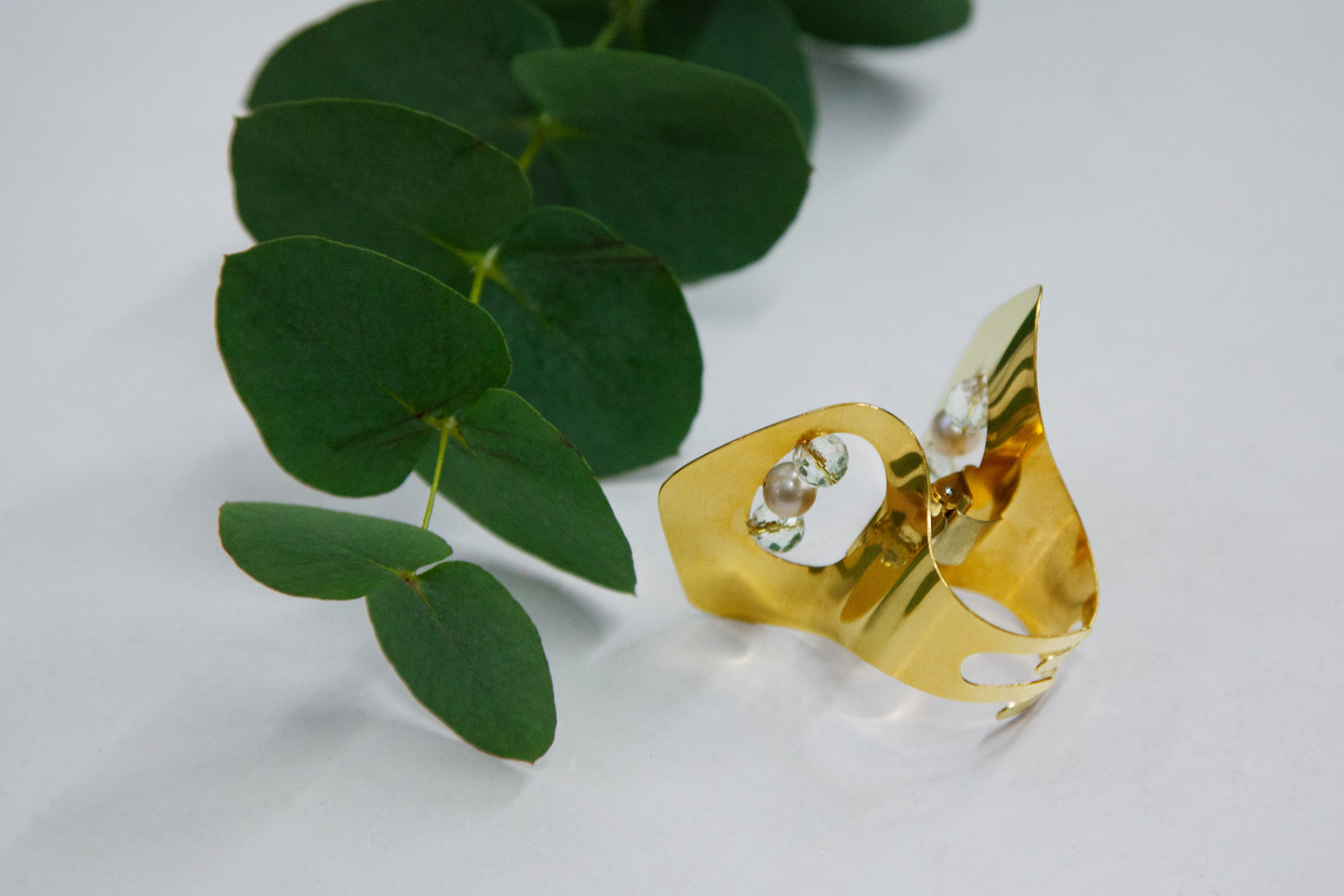 stainless steel gold plated claw clip with rock crystal beads and cultured freshwater pearls