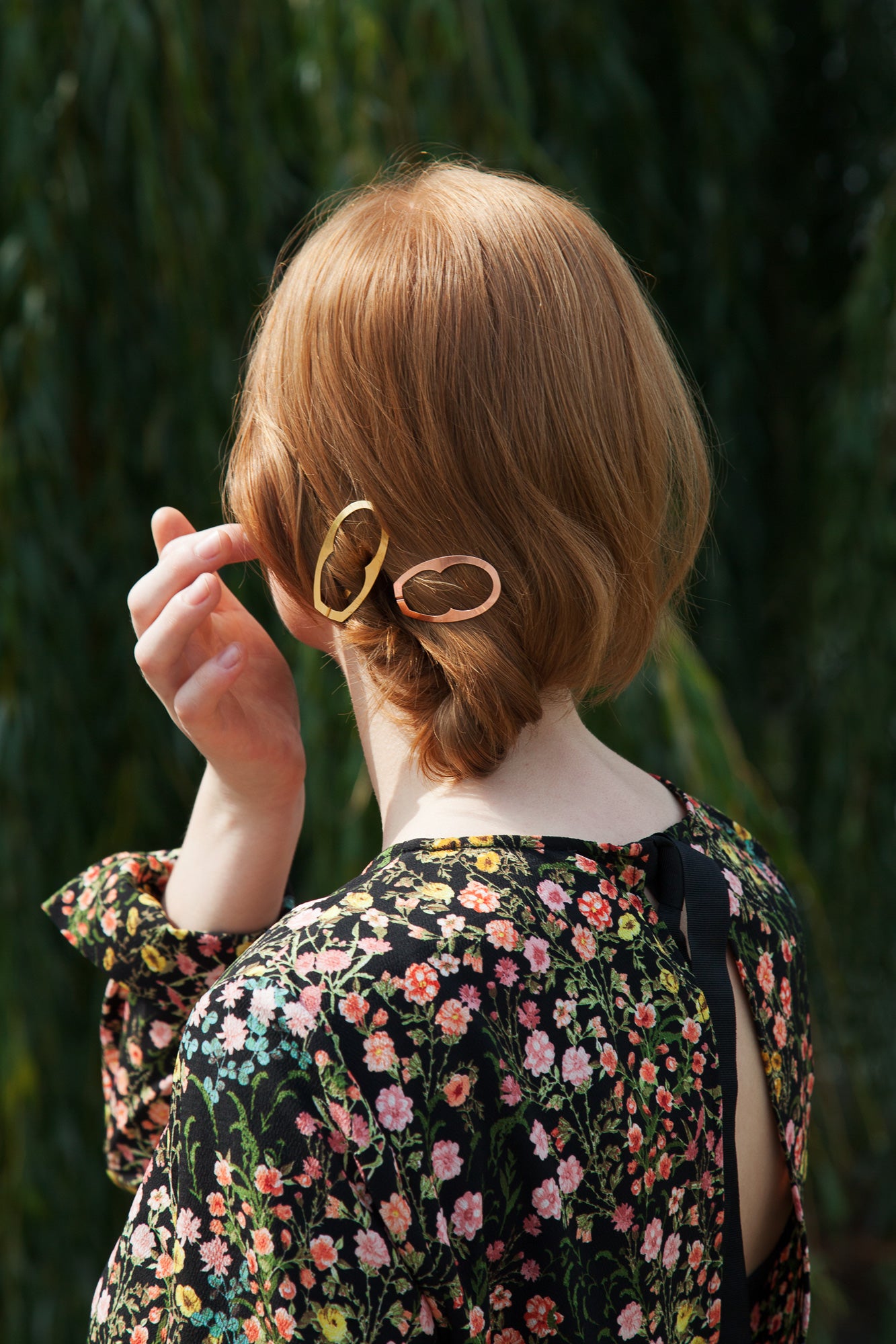 Twisted low bun accessorized with designer barrettes ENID by Clinq 